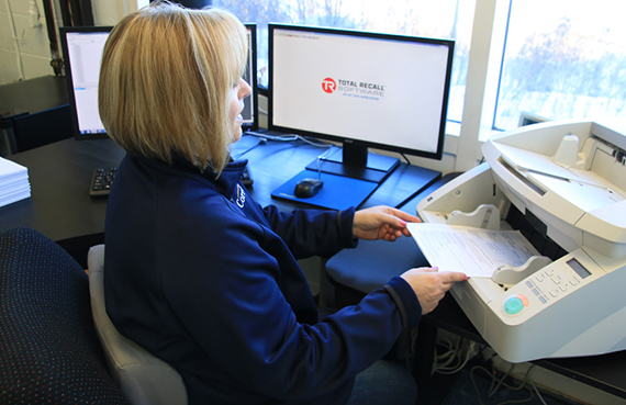 employee scanning documents